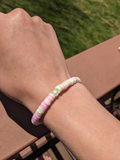 Elevate your style with this cheap, durable, and preppy beachy themed bracelet made with green, white, and pink clay flat beads and a pearl! 🌟 Casual Round Beads Pearl Bracelet For Beach, Casual Pearl Bracelet With Round Beads For Beach, Hypoallergenic Pink Beaded Bracelets For Beach, Casual Round Beaded Bracelets For Beach, Casual Beach Friendship Bracelets, Preppy Xmas Bracelets, Pink Hypoallergenic Beaded Bracelets For Beach, Clay Bracelet Christmas, Trendy Pink Pearl Bracelet For Beach