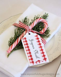 a white plate topped with a candy cane