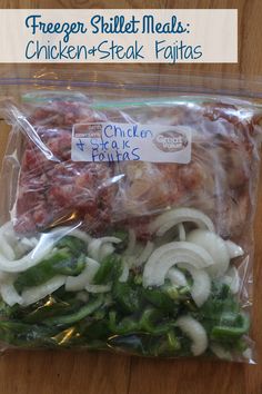 chicken and steak fajitas wrapped in plastic on top of a wooden table with text overlay that reads freezer skillet meals chicken and steak fajitas