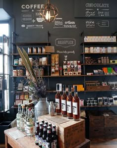 a coffee shop with lots of bottles on the counter