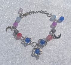 -An adjustable bracelet inspired by BTS' Jungkook's "Still With You". -The bracelet in the pic has 12 beads plus a blue one as charm, but you can take out some beads, if wanted, for the same price. Applicable for charms. -Try NOT to expose the bracelet to water, like wearing it to the beach or showering with it. -If you have any suggestions or questions, feel free to message me. I would be more than happy to help! Jungkook Bracelet, Kpop Bracelet, Bracelet Y2k, Bracelet Inspired, Bracelet Inspo, Bracelet Cute, Bts Merch, Kpop Merch, Adjustable Bracelet