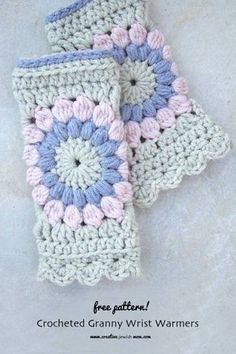 two crocheted granny wrist warmers on a white surface with text that reads free pattern