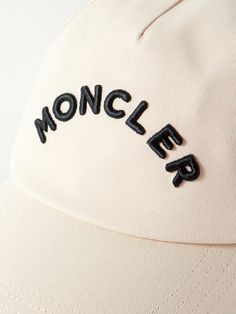 Moncler's baseball cap is embroidered with the arched brand name in thick black lettering across the front. Designed with an internal brow band for comfort, it's made from hard-wearing cotton-gabardine and appliquéd with a signature felt logo above the VECLRO®-fastening back tab. Classic Hats With Logo Detail And Curved Visor, Classic Hats With Logo And Curved Visor, Classic Hat With Logo Print And Curved Brim, Classic Cap With Logo Detail, Classic Hat With Logo Detail And Curved Brim, Classic Hat With Curved Brim And Logo Print, Classic Hat With Logo And Curved Brim, Classic Curved Brim Hat With Logo Print, Classic Hat With Curved Brim And Logo Detail