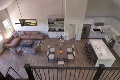 an aerial view of a living room and kitchen