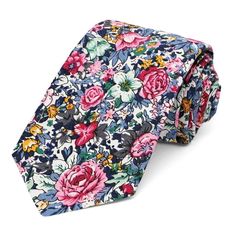 This floral tie is lively! The pattern is vivid and full, mixing dusty blues, pinks, green, gray and the perfect touch of golden yellow. It's made from 100% cotton and cut in a narrow 3-inch width—perfect for a modern wedding look. Matching pocket square are available for purchase, too. Product Features • Narrow 3" width, at the widest point• 57" length, tip to tip• Made from 100% Cotton• Imported Pink Floral Tie Wedding, Blue Suit Floral Tie, Floral Tie Groom, Multicolor Floral Print Wedding Ties, Light Blue Floral Tie, Pink Floral Print Summer Ties, Bride Suit, Floral Necktie, Groom Ties