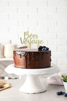 "Lovely handmade \"Bon Voyage\" cake topper. They are made from high quality glitter card stock and they are even more sparkly in person! :) Please note the back is plain white. Wording is approximately 6\" wide. More cake toppers: https://www.etsy.com/uk/shop/JtruDesigns?ref=seller-platform-mcnav&section_id=21838556" Bon Voyage Cake, Glitter Birthday Cake, 40th Birthday Cake Topper, 30th Birthday Cake Topper, 25th Birthday Cakes, Resep Smoothie, Love Cake Topper, Graduation Cake Toppers, 1st Birthday Cake Topper