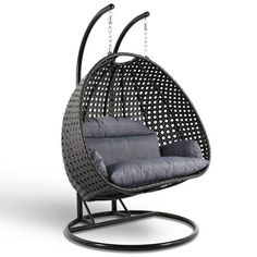 an outdoor swing chair with grey cushions