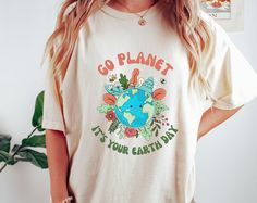 Celebrate Earth Day in style with our comfortable and breathable shirt. Show your love for the planet and spread the message of sustainability with this must-have addition to your wardrobe. Join the movement to protect our planet and wear your passion on your sleeve with our Earth Day t-shirt. Perfect gift for earth day lover and earth day supporter. ⭐️MATERIAL DETAILS ⭐️ --Unisex T-Shirt-- - 100% Airlume combed and ringspun cotton (fiber content may vary for different colors) - Light fabric (4. Casual Text Print Tops For Earth Day, Casual Graphic Print Shirt For Earth Day, Casual Shirt With Graphic Print For Earth Day, Relaxed Fit Letter Print Tops For Earth Day, Casual Slogan T-shirt For Earth Day, Eco-friendly Graphic Print Top For Earth Day, Earth Awareness, Earth Day Everyday, Protect Our Planet