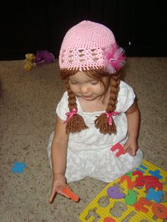 This is my short braid pigtails on an adorable crochet hat. It comes with a cute flower tulle clip with a rhinestone in the middle.   Braids will be 10-12 inches long. If you want a different length, just put the measurement in the notes to seller. Thanks.   Last picture shows the yarn color choices.  Message me with any questions or if you want to see a hat color with a yarn color :).   PLEASE SPECIFY WHAT COLOR RIBBONS AND TULLE CLIP YOU WOULD LIKE IN THE NOTES TO SELLER. IF YOU DON'T, I WILL Braid Pigtails, Short Braid, Autumn Hat, Crochet Wig, Wig Hat, Pigtail Braids, Short Braids, Frozen Inspired, Fall Hats