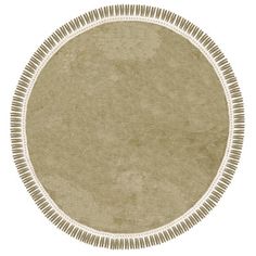 a round rug with fringes on the edges and a white border in the middle