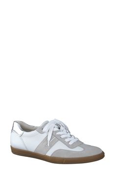 Lace up this sleek sneaker crafted with a suede upper and contrast leather trim for a '70s-inspired athletic look. Lace-up style Leather upper and lining/synthetic sole Imported Sporty Suede Sneakers With Leather Trim, White Leather Trim Sporty Sneakers, White Sporty Sneakers With Leather Trim, Sporty White Sneakers With Leather Trim, Sporty Lace-up Sneakers With Leather Trim, White Low-top Sneakers With Leather Trim, Casual Low-top Sneakers With Leather Trim, Modern Leather Platform Sneakers With Rubber Heel Cap, Athletic Looks