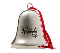 a silver bell ornament with the words wonderful life on it and a red ribbon