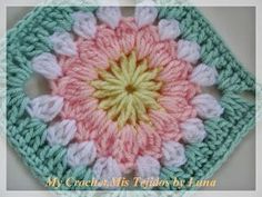 a crocheted square with a flower in the middle and text that reads, my crochet miss teglos by lynn