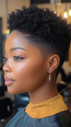 The Tapered Undercut adds a sleek and edgy contrast to your 4C curls, perfect for 2024. This dynamic haircut highlights your natural texture with a bold, modern twist. Click the pin to see more and follow us for the latest hair trends! #TaperedUndercut #4CHair #NaturalCurls #HaircutTrends #CurlyHairStyles Taper Fade Haircut Black Women, Taper Fade Black Women, Female Tapered Fade Black Women, Low Taper Fade Haircut Women, Taper Fade Women, 4c Tapered Haircut, Tapered Cut Natural Hair 4c, Undercut Black Women, 4c Haircut