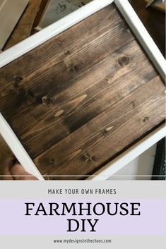 a person holding up a frame with the words make your own frames farmhouse diy