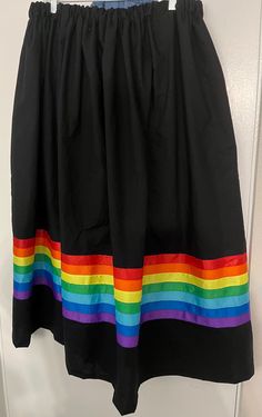 Ribbon skirt - black and rainbow ribbons Ribbon Skirt -Authentic Native American design for Pow Wow and Native American dances.  Skirt has an elastic waist that gives it the elusion of an A-line skirt.  Most skirts are 100% cotton or primarily cotton.  Ribbon Skirt is meant to be a mid-calf-length skirt and is typically 31 - 32 inches. Skirt length may be adjusted, if it needs to be longer please choose the the long skirt option. If you do not find it on the LONG skirt post please message me for instructions.  PLEASE CHOOSE YOUR SIZE BELOW!!  *Select rush shipping if your skirt needs to moved to the top of my list and outside of the normal time frame. The rush shipping fee is for my time and does not change the type of shipping. The rush fee is $30. Click on the link below. I ship all orde Rainbow Ribbons, Native American Dance, Native American Dress, Ribbon Skirt, American Dress, Black And Black, Ribbon Skirts, Cotton Ribbon, Native American Design