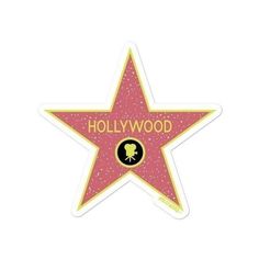 a star shaped sticker with the hollywood logo on it's side, in pink glitter