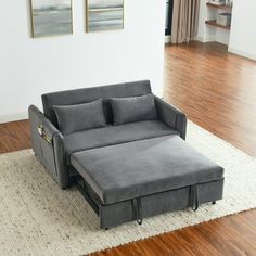 a couch that is sitting on top of a rug