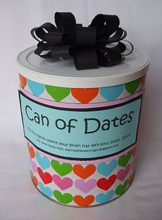 an open canister with hearts on it and a black bow at the top that says can of dates