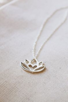 An original Lola&Cash protea necklace featuring a hidden heart— d e t a i l s —-protea measures 2cm wide-hand sawn out of solid sterling silver-completed in a mirror finish-includes a 45cm chainThis pendant is also available in gold as seen in last picturehttps://www.etsy.com/listing/621948340/gold-protea-pendant-solid-9ct-yellow?ref=shop_home_active_1-All Lola&Cash jewellery will arrive gift wrapped>>>——————————<<<>>>——————————<<<Please Note - Made to order - Rush orders can be accommodated upo Small Minimalist Necklace As A Gift, Small Minimalist Necklace Perfect For Gifts, Small Minimalist Necklace For Gift, Minimalist Small Necklace Perfect For Gifts, Delicate Small Jewelry Gift, Delicate Jewelry For Gifts, Silver Dainty Birth Flower Necklace, Personalized Silver Necklace For Meditation, Silver Birth Flower Necklace For Wedding