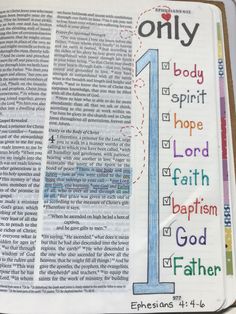 an open bible with the number one on it and other words written in different colors