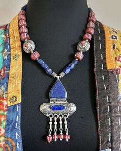 Yemeni inlaid lapis lazuli Turkomen pendant & Venetian old trade beads necklace. | eBay Traditional Hand-strung Blue Necklace, Traditional Lapis Lazuli Gemstone Beads Necklace, Traditional Jewelry With Round Lapis Lazuli Beads, Traditional Lapis Lazuli Necklace With Gemstone Beads, Amulet Style Necklaces With Large Pendant And Round Beads, Artisan Necklace With Polished Lapis Lazuli Beads, Blue Lapis Lazuli Necklace With Large Beads, Spiritual Hand-strung Lapis Lazuli Necklaces, Traditional Lapis Lazuli Beaded Jewelry