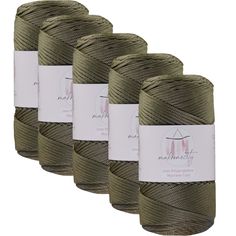 four spools of thread in olive green