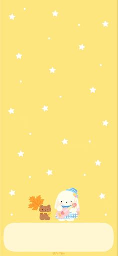 a yellow background with white stars and a small teddy bear sitting on top of it