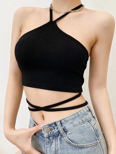 Strappy Stretch Summer Tops, Strappy Stretch Tops For Summer, Stretch Strappy Summer Tops, Solid Strappy Tops With Built-in Bra, Strappy Top With Built-in Bra For Spring, Fitted Strappy Camisole For Spring, Spring Strappy Tops With Built-in Bra, Trendy Solid Strappy Tops, Black Strap Top For Spring