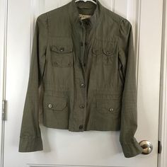 Ann Taylor Loft Women's Xs Military Fatigue Style Shirt Or Light Jacket Shacket Olive Green Fitted Elastic Waist Snap And Zipper Double Closure 5 Functioning Pockets 100% Cotton Measurements Laid Flat 19 Inches Across From Armpit To Armpit 20 Inches Long Front And Back Looks New Unworn Neutral Cottagecore Militarycore Y2k Autumn Transition Grunge Khaki Blazer With Flap Pockets For Spring, Fitted Green Utility Jacket With Pockets, Fitted Casual Utility Jacket With Pockets, Fitted Long Sleeve Khaki Utility Jacket, Fitted Khaki Utility Jacket With Long Sleeves, Fitted Khaki Utility Jacket, Spring Utility Khaki Blazer, Casual Fitted Utility Jacket With Button Closure, Fitted Khaki Utility Jacket For Spring