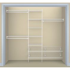 an empty closet with shelves and wire shelving