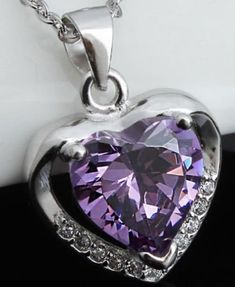 Big Purple heart decorated with brilliant small stones forming a secondary heart. 40cm Chain included Crystal Heart Necklace With Heart Charm, Silver Heart Necklace With Sparkling Stones, Valentine's Day Heart Pendant Necklace With Sparkling Stones, Valentine's Day Sparkling Heart Necklace, Violet Heart, Black Mermaid Dress, Mood Stone, Baby Moses, Financial Growth