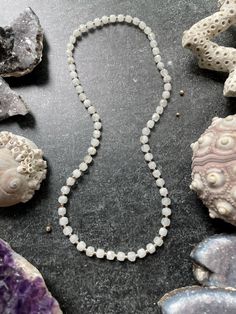 This ONE OF A KIND 17" rainbow moonstone gemstone beaded necklace is made with 14k gold filled 2 mm seamless rounds snugged between 4-5 mm faceted sparkly rainbow moonstone gemstones and strung onto high quality pre-stretched elastic cording. The knot is enclosed in a secret crimp bead for a seamless infinity style. To ensure longevity, it is recommended that this necklace be gently rolled over your head rather than stretched wide over and over again.   4-5MM Natural Rainbow Moonstone Gemstone Grade AA Micro Faceted Square Cube Loose Beads.  P A I R S ∙ W E L L ∙ W I T H   Shown at 17"  and paired with these other gorgeous MADE BY MAGGIE original designs       * 3 mm beaded stretch necklace at 15": https://jewelrymadebymaggie.etsy.com/listing/1524685657       * Gold filled butterfly neckla Moonstone Gemstones, Crimp Beads, Gemstone Beaded Necklace, Moonstone Necklace, Natural Rainbow, Square Cut, Butterfly Necklace, Gold Filled Jewelry, Rainbow Moonstone