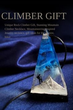 a rock climber gift sitting on top of a blue cloth with the caption's description below it