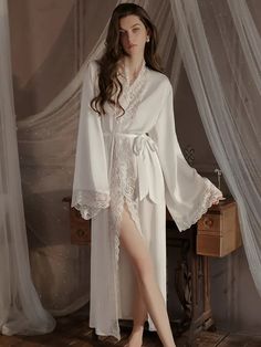 Summer Ice Silk Lace Robe
Main fabric: 95.3% polyester 4.7% spandex
Lace: 89.3% nylon 10.7% spandex




Robe Size/cm


Length


Bust


Sleeve


Shoulder


Fit weigh




M


131


103


46


38.5


40-55kg




L


132


107


47


39.5


55-60kg




XL


133


111


48


40.5


60-70kg







 	The above size is manually measured by “tiling-stretching”, there may be an error of 1-3cm!
 	The size is for reference only, please choose according to your size.
 	It is recommended to wash by hand in co Fitted Long Sleeve Satin Sleepwear, Fitted V-neck Sleep Robe, Fitted V-neck Robe For Sleep, White Long-length Sleepwear For Loungewear, Fitted Satin Robe For Loungewear, Fitted Robe For Home, Fitted Long Sleeve Sets For Night, Fitted Satin Night Robe, White V-neck Loungewear Robe