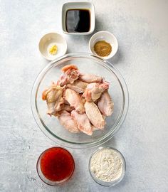 the ingredients to make chicken wings are in bowls