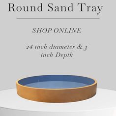 round sand tray on top of a white table with text reading round sand tray shop online 24 inch diamer & 3 inch depth