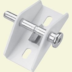 a white metal bracket with two screws