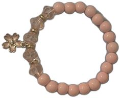 Pink Flower-shaped Beaded Charm Bracelet, Spring Rose Gold Flower Bracelet, Spring Rose Gold Flower Bracelets, Spring Flower-shaped Adjustable Crystal Bracelet, Adjustable Flower Crystal Bracelet For Spring, Adjustable Spring Crystal Bracelet With Flower Shape, Elegant Flower Shaped Crystal Bracelet For Spring, Elegant Flower Crystal Bracelet For Spring, Elegant Pink Bracelets For Spring