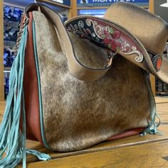 Ariat Lorelei Tan Leather Hair On Shoulder Bag Tan Leather, Blue Brown, Shoulder Bags, Color Blue, Bag Lady, Shoulder Bag, Hats, Leather, Hair