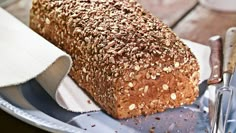 a loaf of bread sitting on top of a metal plate