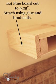 a close up of a piece of wood on the wall with text above it that reads, how to fix a pine board cut to 9 25's attach using glue and brad nails