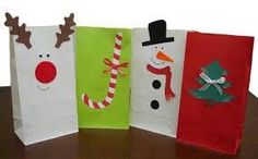 three paper bags with christmas decorations on them