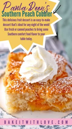 a piece of southern peach cobbler on a plate with whipped cream in the middle