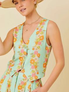 Unleash your inner flower child with the Callie Floral Vest. This button-up vest features a delicate floral print and a flattering V-neckline, perfect for those warm summer days. Sleeveless for maximum comfort, this vest is a must-have for any boho babe. Bring on the sunshine! Teen Dresses, Kimono Outerwear, Floral Vest, Floral Vests, Wedding Decor Style, Flirty Dresses, Plus Size Shopping, Dresses For Teens, Flower Child