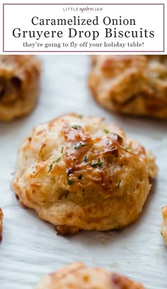 some food that is sitting on top of a white paper towel with the words, caramelized onion gruyer drop biscuits they're going to fly off your holiday table