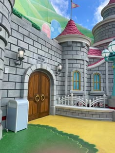 a cartoon castle with a door and some lights