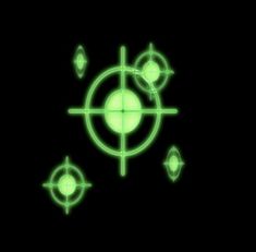 an image of some green circles and arrows on a black background in the night time