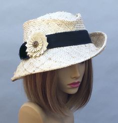 This couture hat was handmade on an antique hat block using a knotted parasisal straw. This lovely hat is embellished with millinery grossgrain ribbon, which can be changed to any color. Please indicate your head size measurement when ordering (measure your head horizontally just above your eyebrows). When you receive your hat, there will be a small ribbon inside to fine-tune the fit, and a hat box for safe storage. Note: Colors will vary depending on your monitor and there will also be some var Elegant Handmade Panama Hat With Curved Brim, Handmade Elegant Hat Bands For Beach, Handmade Elegant Hat Bands For The Beach, Elegant Handmade Hat Bands For Beach, Elegant Handmade Flat Brim Straw Hat, Handmade Elegant Fedora With Curved Brim, Elegant Handmade Fedora With Short Brim, Elegant Handmade Fedora With Curved Brim, Elegant Handmade Short Brim Fedora