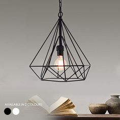 This designer simple and minimalist geometric cage light  is inspired by construction site lighting, adapted for a contemporary environment. The industrial appearance of the steel cage designed to protect the bulb allows a flood of ambient light to illuminate any workspace. Perfect the look with any Edison filament bulb.  
 
 
 
 
 Number of bulbs 
 1 (sold separately) 
 
 
 Power 
 60W, 110 - 240V 
 
 
 Fitting type 
 E27 
 
 
 Material 
 Metal 
 
 
 Colour 
 White or Black 
 
 
 Measurements : 
 40cm diameter (15.8in) 38cm height (15in) 
 
 
 Measurements, chain: 
 90cm (3ft) - extendable upon request 
 
 
 Total package weight 
 2.6 kg - 5 
 
 
 Compatibility: 
 
 This light is compatible to be used in: 
 USA  110volt. This light is certified 
 EU / UK  220~240volt. This light is certif Pendant Lamps Kitchen, Geometric Lamp, Cage Pendant Light, Cage Light, Steel Cage, Bedroom Light, Vintage Bulb, White Pendant Light, Design Philosophy